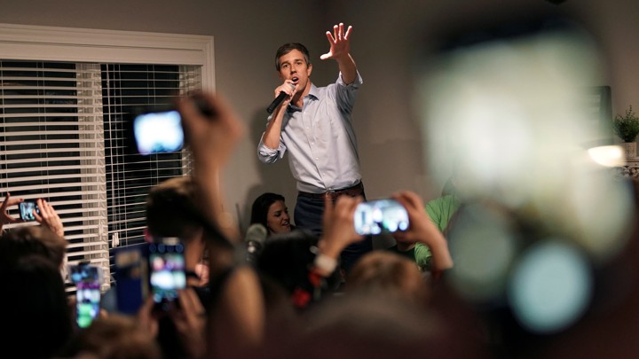 Beto O'Rourke speaks with a supporter in Iowa.