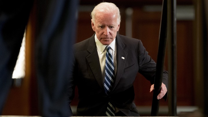 Joe Biden climbing stairs