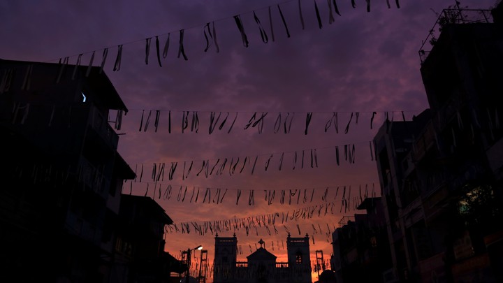 Funeral banners hang across the street in front of St. Anthony's Shrine in Colombo, Sri Lanka.