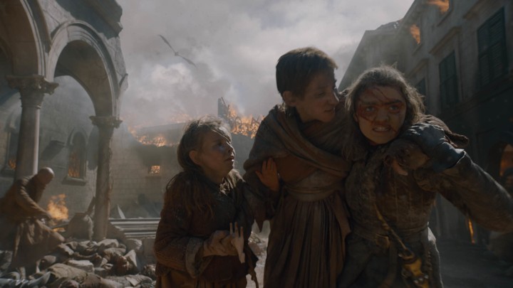 Arya Stark assists innocent victims in King's Landing.
