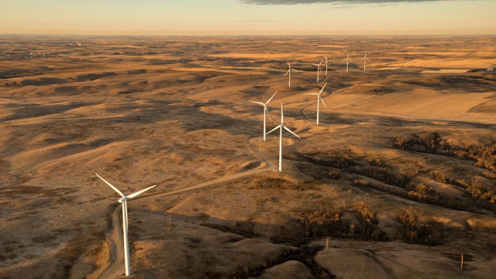 Wind turbines rise from the prairie south of Minot, North Dakota, in this 2013 photo.