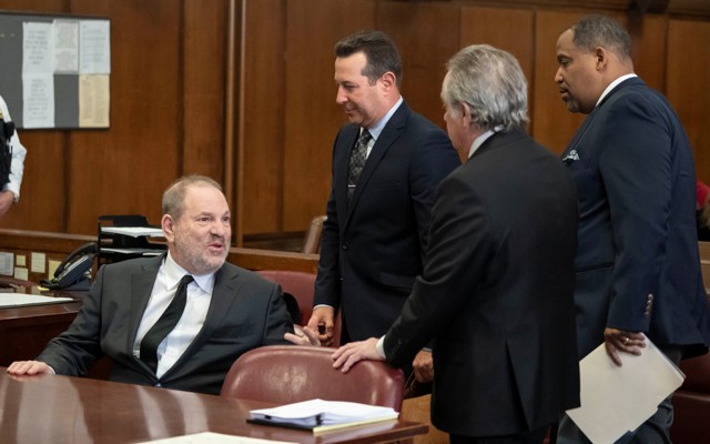 Film producer Harvey Weinstein with attorneys Jose Baez, Ronald S. Sullivan Jr., and Benjamin Brafman