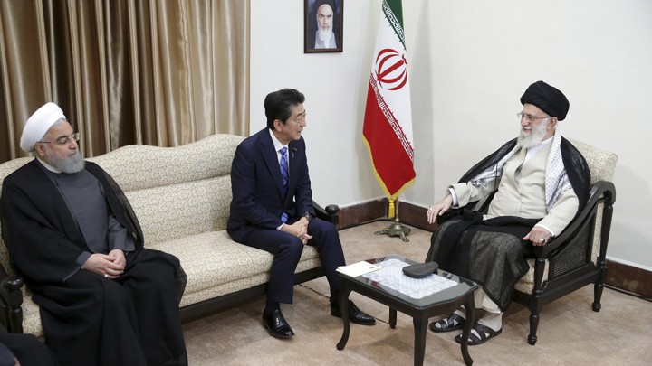 Iranian President Hassan Rouhani, Japanese Prime Minister Shinzo Abe, and Ayatollah Ali Khamenei meet in Tehran on June 13.