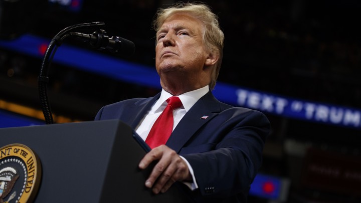 Donald Trump standing at a podium