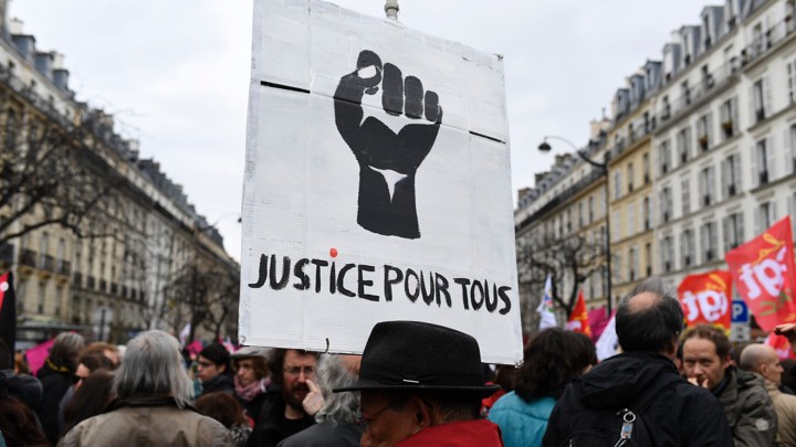 Protesters attend a demonstration against police brutality and racism in Paris in 2017.