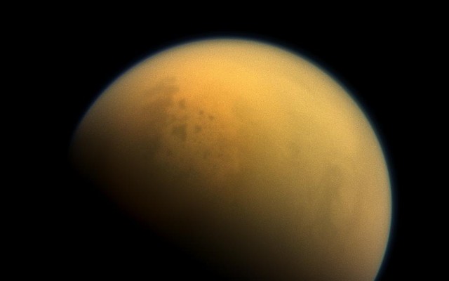 Lakes peek out through the Titan haze.