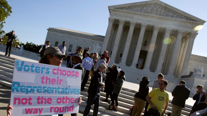 Demonstrators rallied during oral arguments in Gill v. Whitford, a case about partisan gerrymandering in electoral districts, on October 3, 2017.