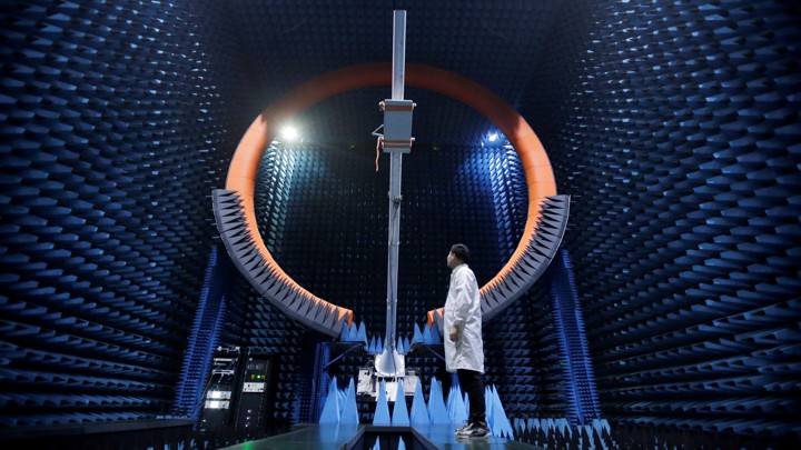 An engineer works at a Huawei manufacturing center in Dongguan, China.