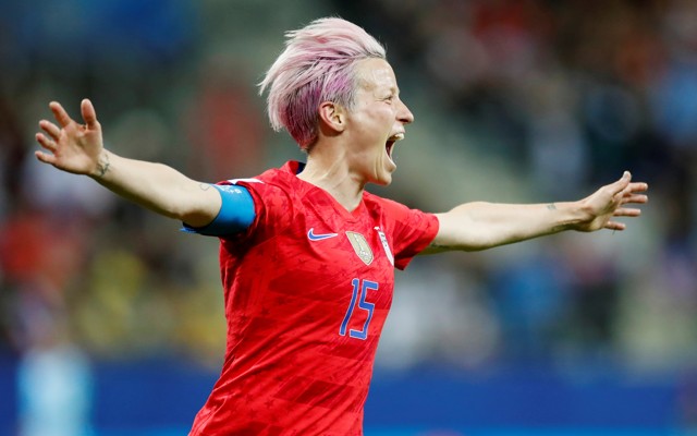 Megan Rapinoe celebrates scoring the ninth goal for the U.S. during a World Cup game