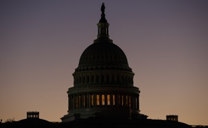 The U.S. Capitol Building dome is seen before the sun rises in Washington, D.C.