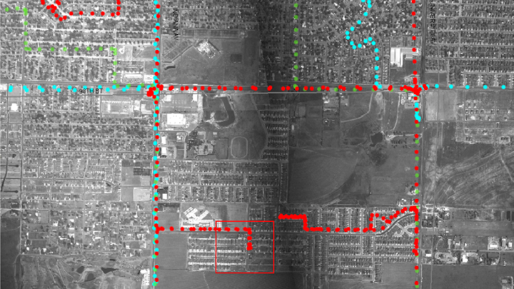 A town viewed from high above via aerial-surveillance camera