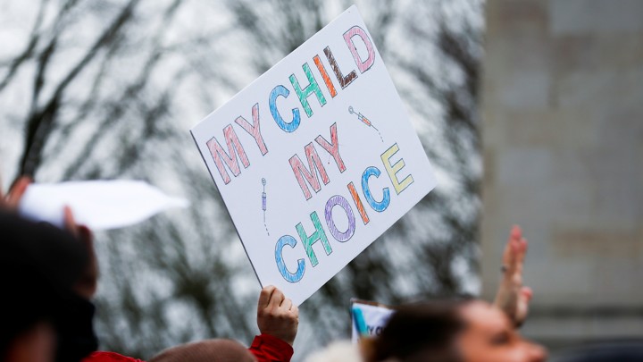An anti-vaccine protest sign.