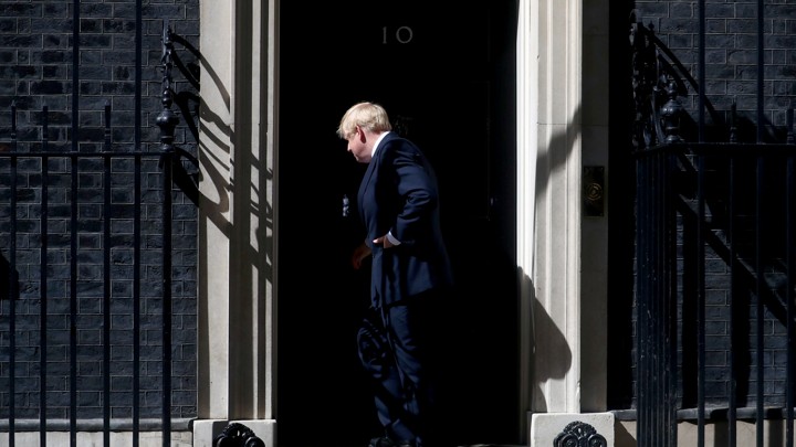 Boris Johnson enters 10 Downing Street.