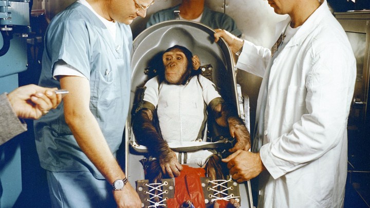Ham the chimpanzee, with veterinarian Bill Britz in the white coat, in 1961