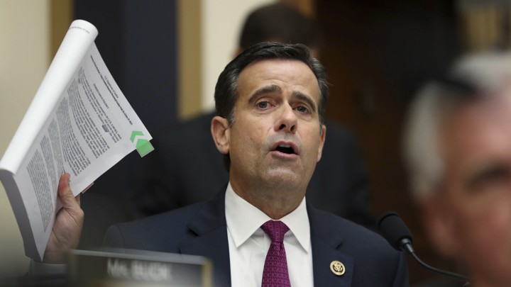 Representative John Ratcliffe Displays a Report