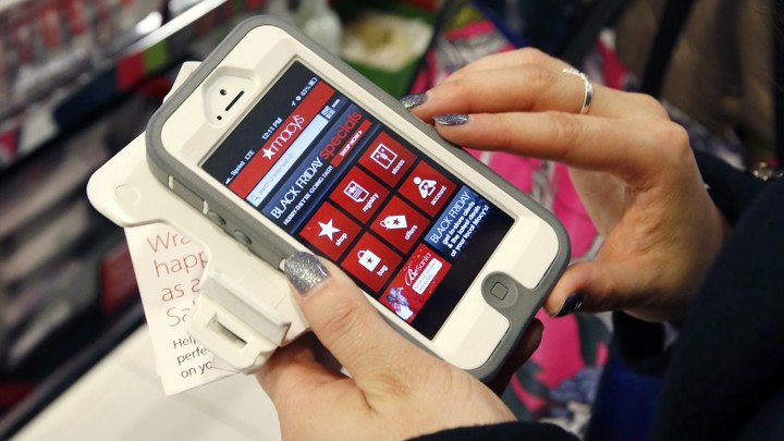 A person shops on a smartphone.