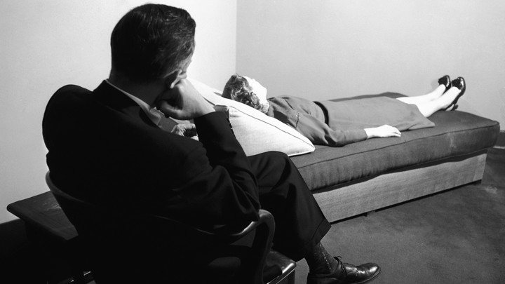 A doctor listens to a patient at the New York Psychoanalytic Institute Treatment Center in New York in 1956.