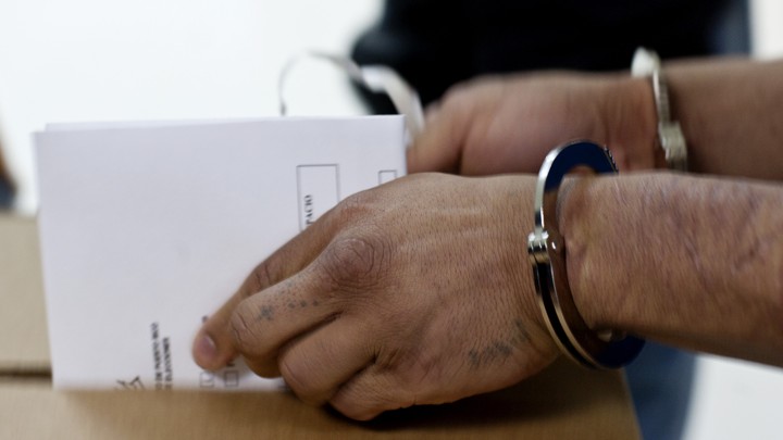 An inmate casts his ballot ahead of a referendum in Bayamón Correctional Complex, in Puerto Rico.