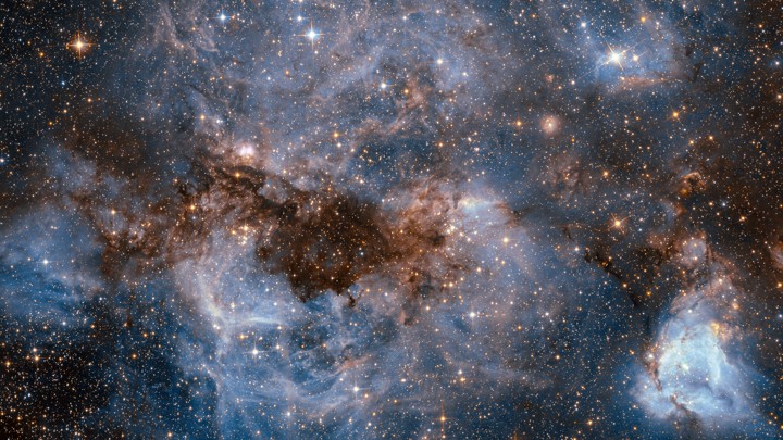 Gas around one of the Milky Way's satellite galaxies glows white.