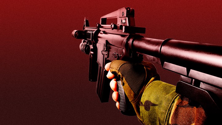 A first-person view of an arm holding a gun in a video game