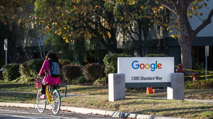 A person rides a bike at Google's Mountain View Campus.