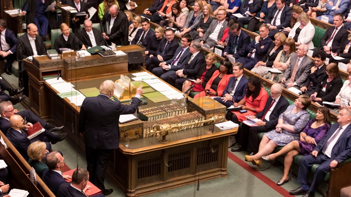 Boris Johnson points at opposition lawmakers in Britain's House of Commons