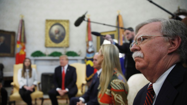 John Bolton sits in on a meeting with President Donald Trump, Vice President Mike Pence, Ivanka Trump, and Fabiana Rosales in the Oval Office.