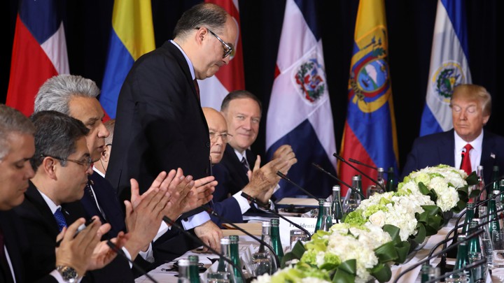 Julio Borges stands as Latin American diplomats, Mike Pompeo, and Donald Trump applaud.
