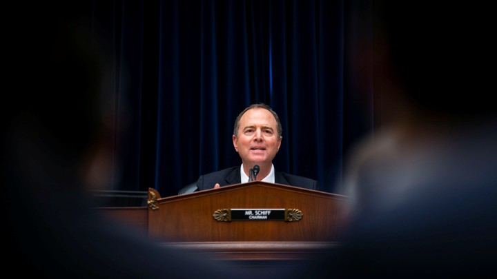 Adam Schiff, center, speaks on Capitol Hill.