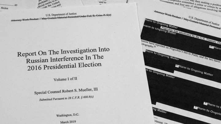 A photo of the redacted version of the Mueller report