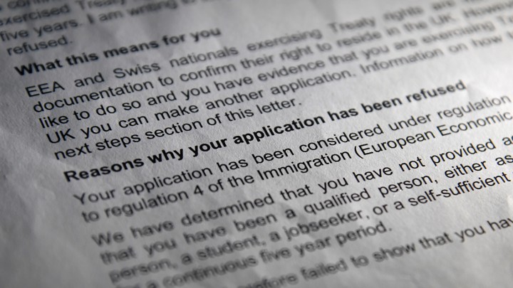A close-up of a letter from the Home Office denying an EU national's request for permanent residency.