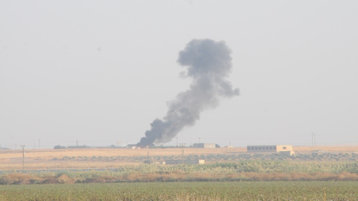 Smoke rises from the Syrian side of the border as it is pictured from the Turkish town of Akcakale in Sanliurfa province