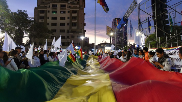 People attend a rally for peace in Cochabamba, Bolivia, on November 21, 2019.