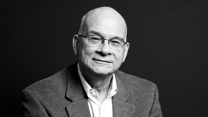 Timothy Keller sitting on steps