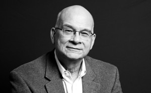 Timothy Keller sitting on steps