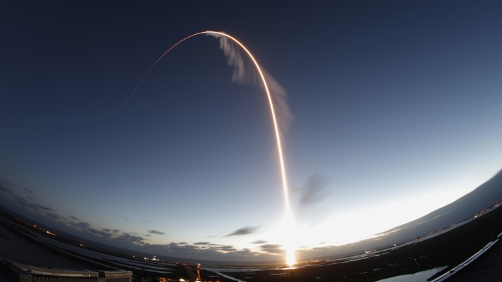 A long-exposure view of the Atlas V rocket, with the Boeing Starliner capsule on top, launching into space this morning