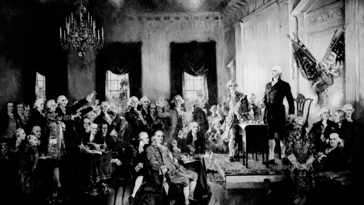 A painting of George Washington presiding over the signing of the Constitution at the Constitutional Convention in Philadelphia on September 17, 1787