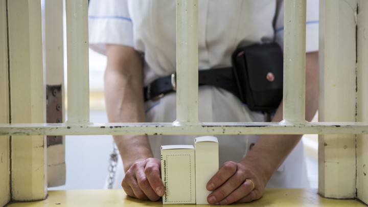 An incarcerated person visits the prison nurse to get his daily medication in Dorset, England.