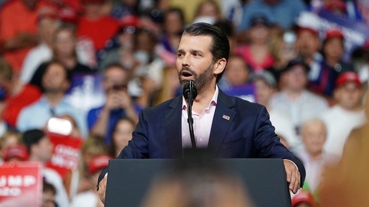 Donald Trump Jr. speaks in front of a crowd.