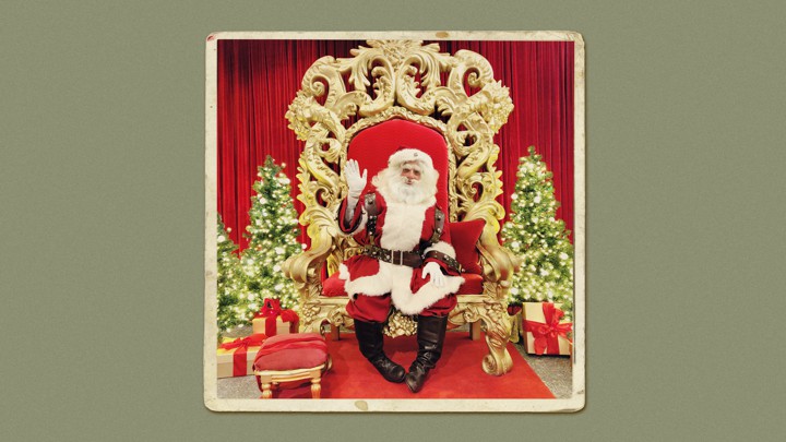 A photo of Noam Osband in his Santa costume.
