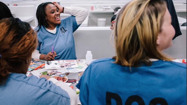 Bria Holloway, who is five weeks pregnant, attends a prenatal doula class held at Cook County Jail on November 13, 2019. The group meeting is every Wednesday. This session focused on making a vision board as well as a birth wish list.