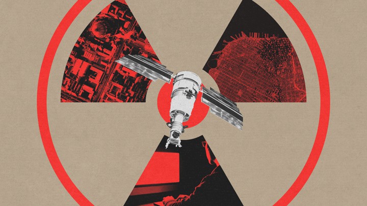 a satellite superimposed on a nuclear symbol