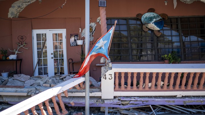 A collapsed house is seen after an earthquake hit the island in Guanica, Puerto Rico, on January 7, 2020.