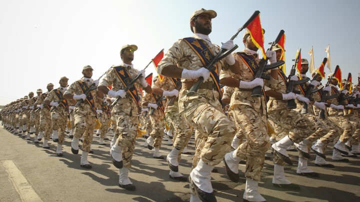 Members of Iran’s Islamic Revolutionary Guard Corps march during a commemoration of the Iran-Iraq War in 2011.