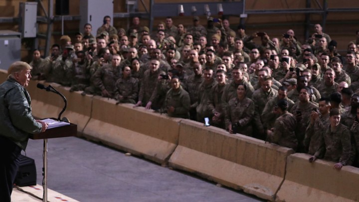 President Donald Trump speaks to U.S. troops.