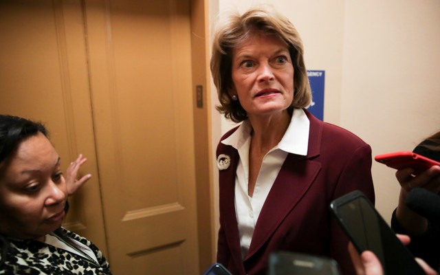 Senator Lisa Murkowski talking to reporters