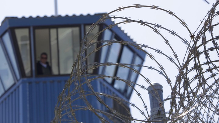 Razor wire atop the fence at a California prison
