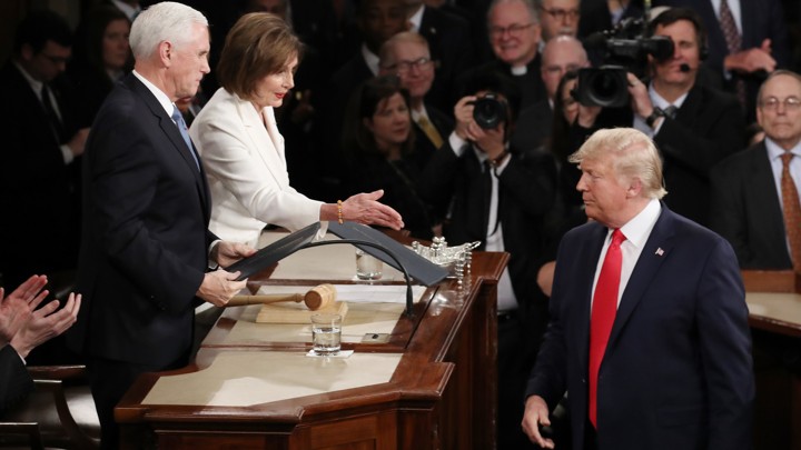 Donald Trump arrives in Congress to deliver the State of the Union. He refuses to shake Nancy Pelosi's hand.