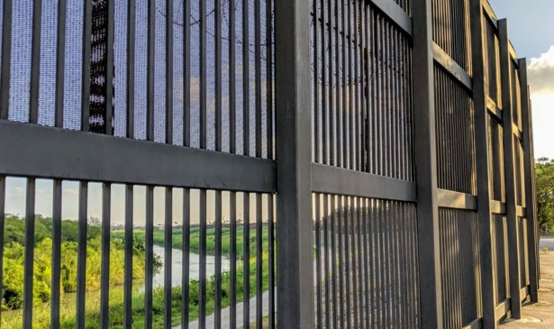 From the Brownsville side, the wall. On the other side is the Rio Grande, whose centerline marks the official border between the United States and Mexico in this part of Texas.