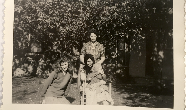 The author's sister (on lap), mother (left), great-aunt (rear), and great-grandmother in rural Minnesota, circa 1947